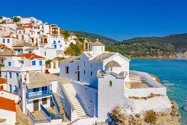 View of Panagitsa Tou Pirgou church over the bay, Skopelos, Greece